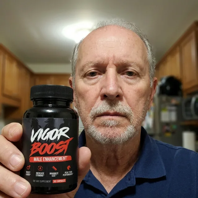 A VigorBoost customer holding the bottle